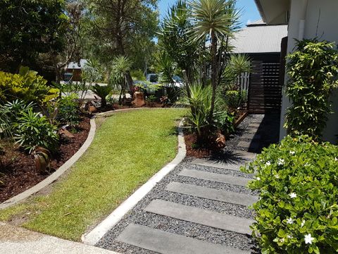 Clean Lawn With Trimmed Bushes — Bruce Jackman’s Advanced Landscapes in Cairns, QLD Clean Lawn With Trimmed Bushes — Bruce Jackman’s Advanced Landscapes in Cairns, QLD