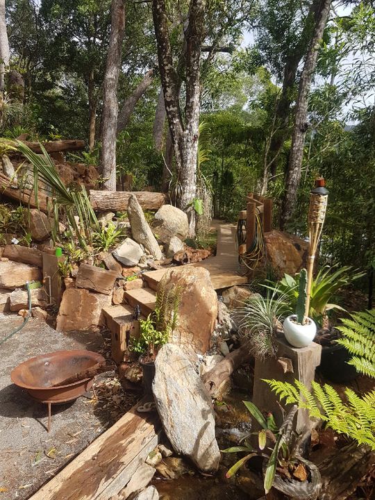 Stone Stairs Integrated Into Rocks — Bruce Jackman’s Advanced Landscapes in Cairns, QLD Stone Stairs Integrated Into Rocks — Bruce Jackman’s Advanced Landscapes in Cairns, QLD