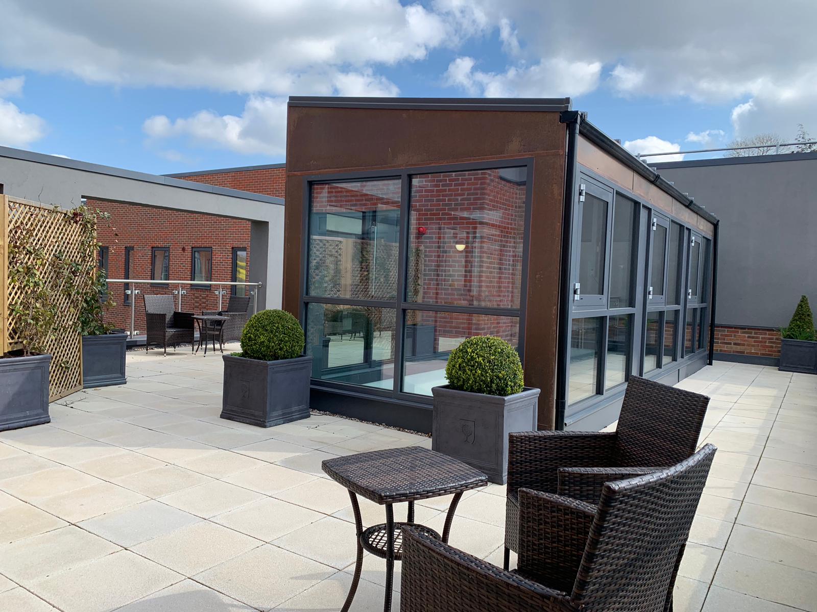 Roof terrace with glass entryway