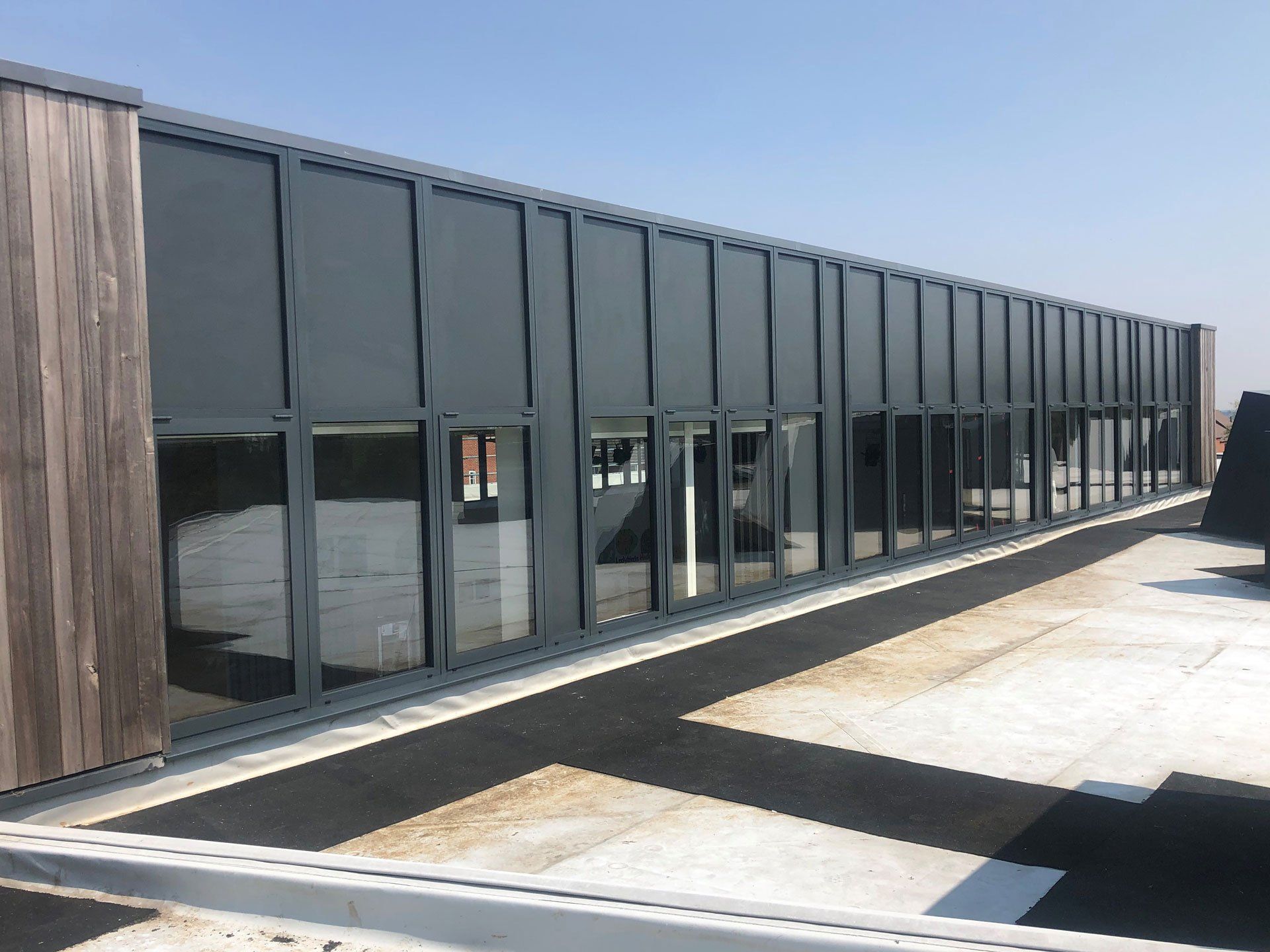 Long low glass fronted building