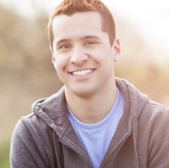 Photo of guy with invisalign
