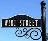 A street sign for wirt street is hanging on a pole.