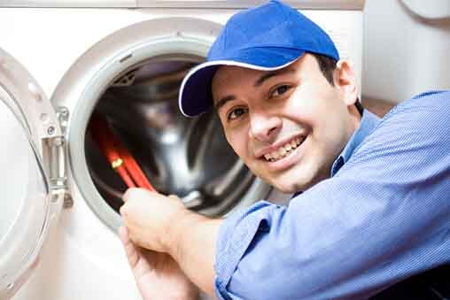 Techinican Repairing a Washing Machine – Prompt HVAC & Appliance Service in Plainfield, IL Techinican Repairing a Washing Machine – Prompt HVAC & Appliance Service in Plainfield, IL