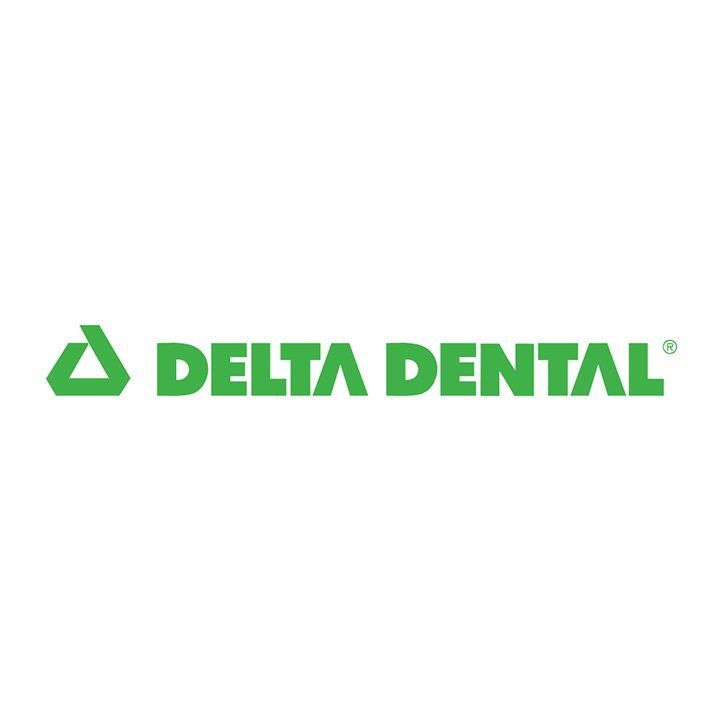 Luna-Dental-Dallas- Delta Dental logo with a green triangle and text.