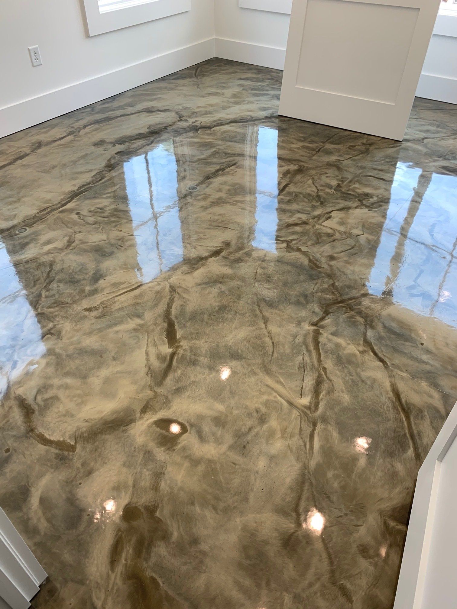 Flooring With Window Reflection — in Charleston, SC — Lowcountry Surface Coatings