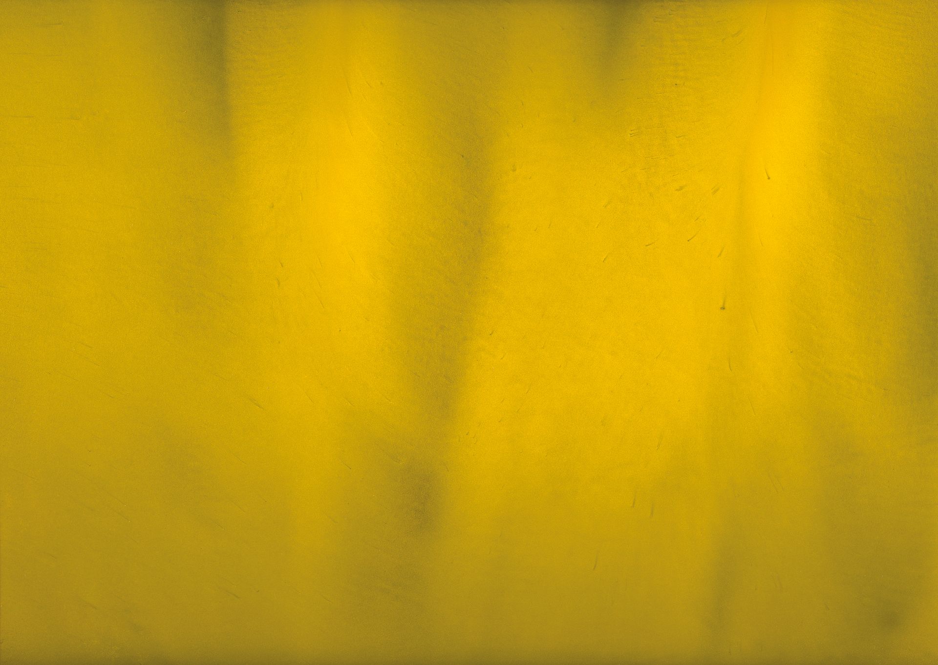 Yellow abstract art with vertical light streaks.
