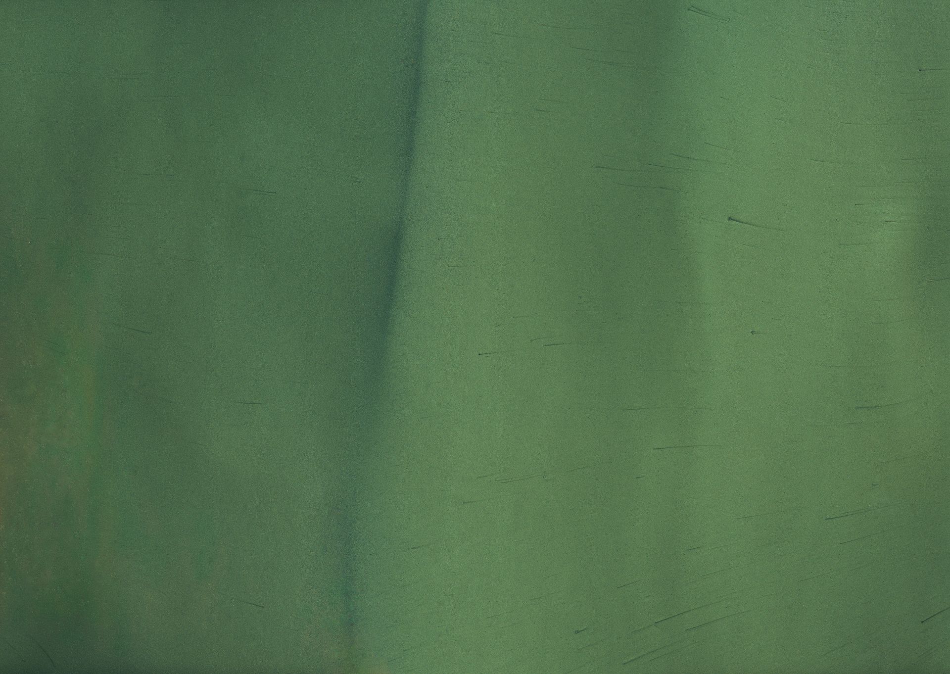 Green background with subtle shading.
