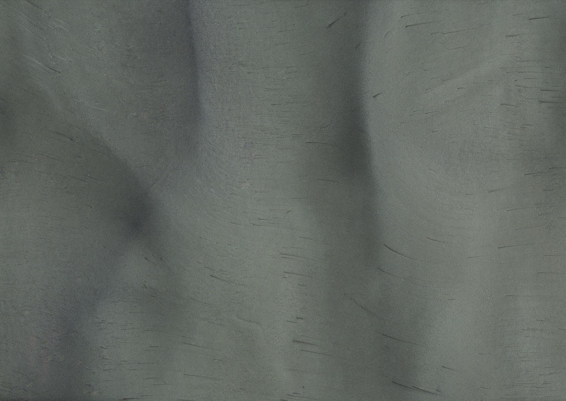 Close-up of teal fabric with gentle folds and subtle texture.