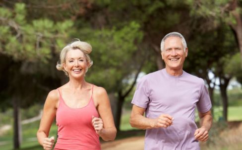 Senior couple running
