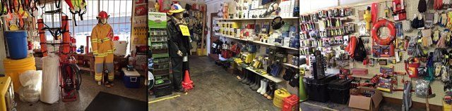 Interior of a store displaying firefighter equipment, including mannequins, shelves of gear, and safety items.