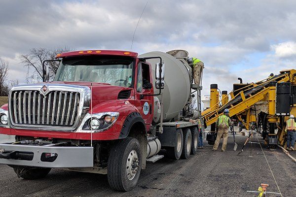 Truck Mixer Unloading Concrete — Westminster, MD — Thomas, Bennett & Hunter, Inc. Truck Mixer Unloading Concrete — Westminster, MD — Thomas, Bennett & Hunter, Inc.