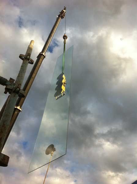 crane installation of large glass