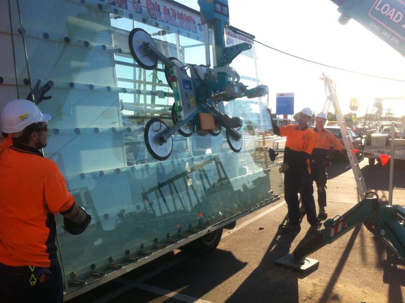 glaziers installing glass