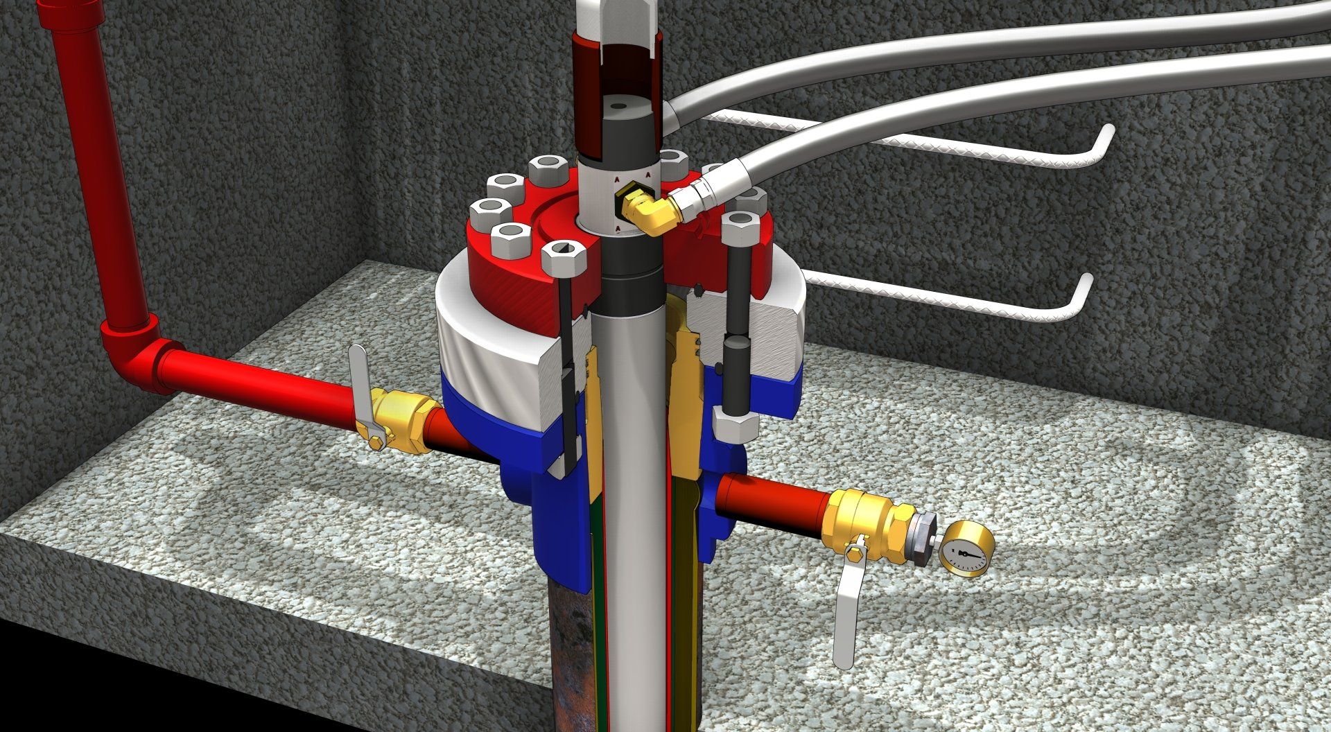 Red and yellow piping attached to a central valve assembly in a gray industrial setting