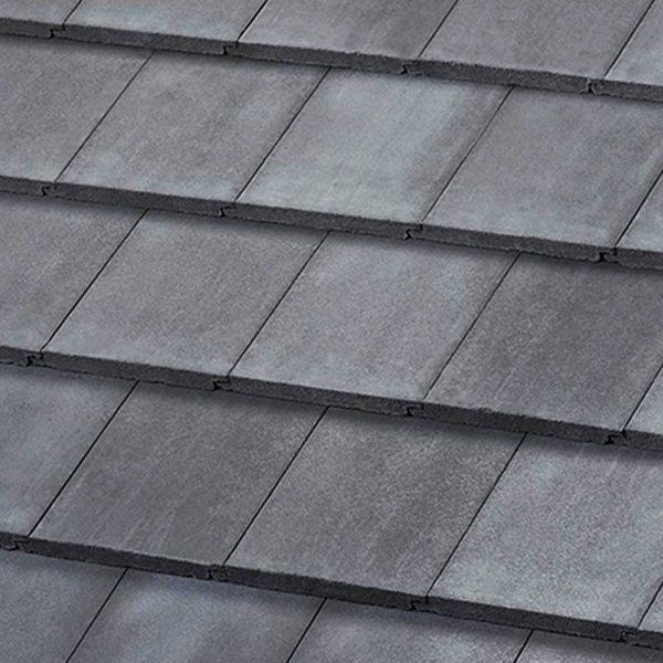 A close up of a gray concrete roof