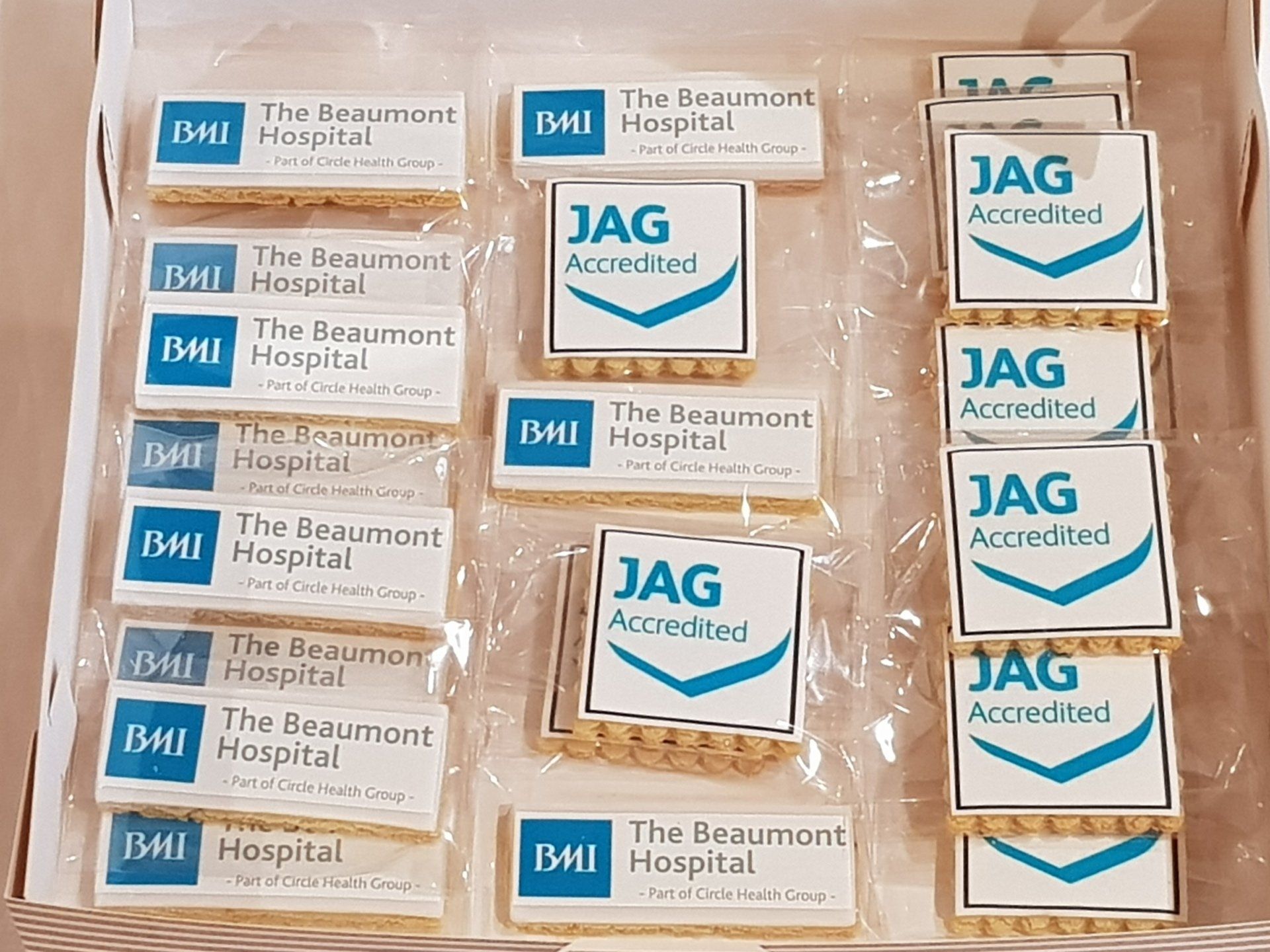 A box of jag accredited cookies sits on a table