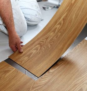 Man laying PVC-floor