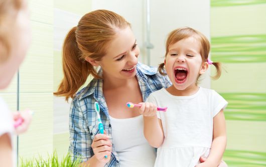 Affordable Dentistry — Father and Daughter Dental Appointment in Vacaville, CA