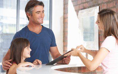 Affordable Dentistry — Father and Daughter Dental Appointment in Vacaville, CA