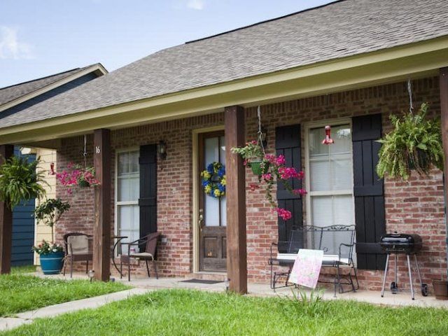 Exterior of Cypress Cove - brick with black shutters