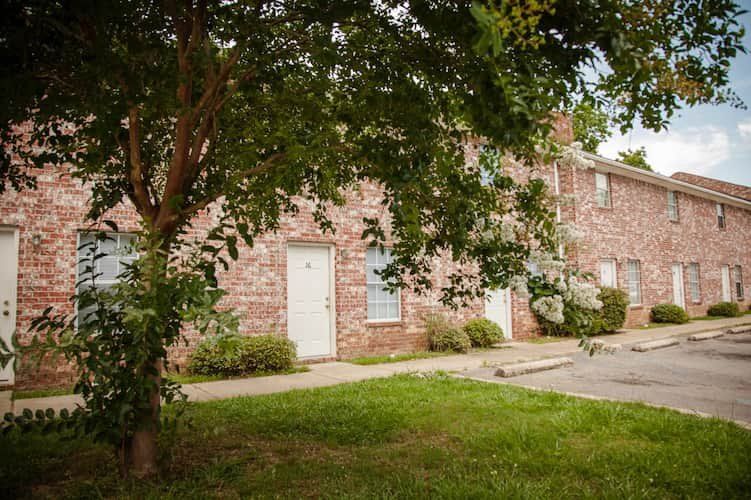 Exterior of Golden Eagle II Townhouses - Brick, two-story building