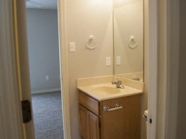 Half bathroom with small vanity