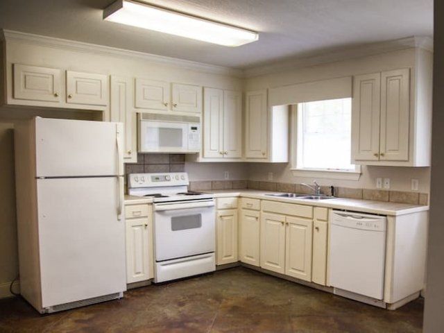 Kitchen with fridge, oven, and dishwasher