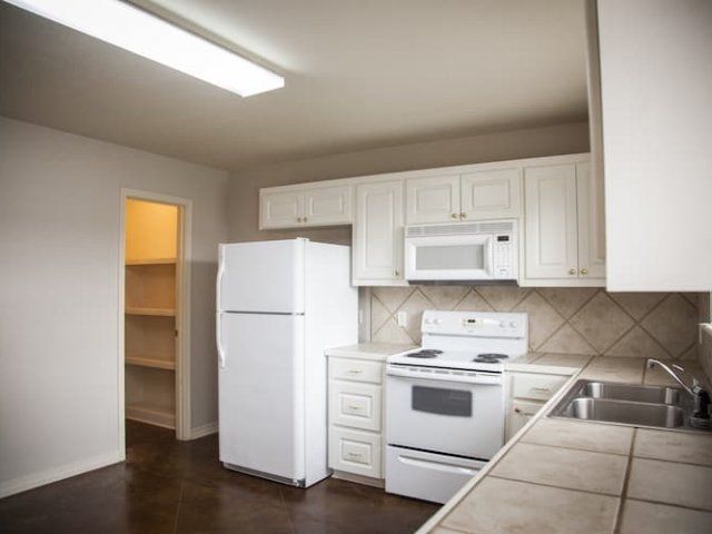 Kitchen with tile countertops