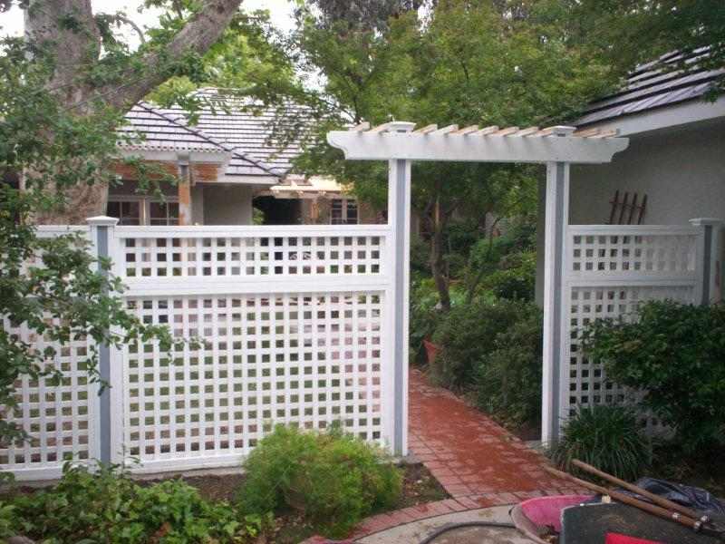 House entrance made with wood fence— Wood Fences in Bakersfield, CA
