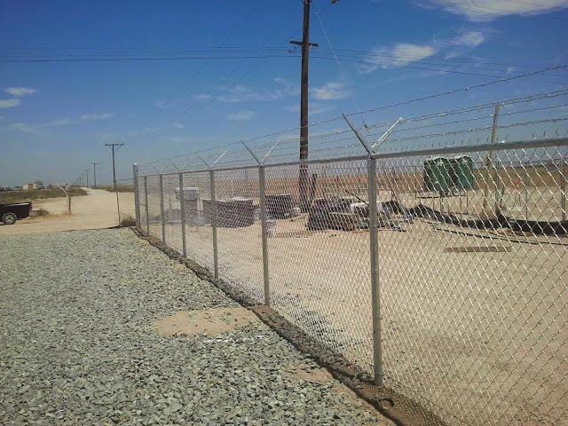 Chainlink fences sideways — Wood Fences in Bakersfield, CA