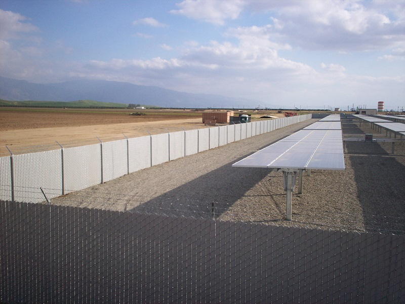 Chainlink fence in road — Wood Fences in Bakersfield, CA