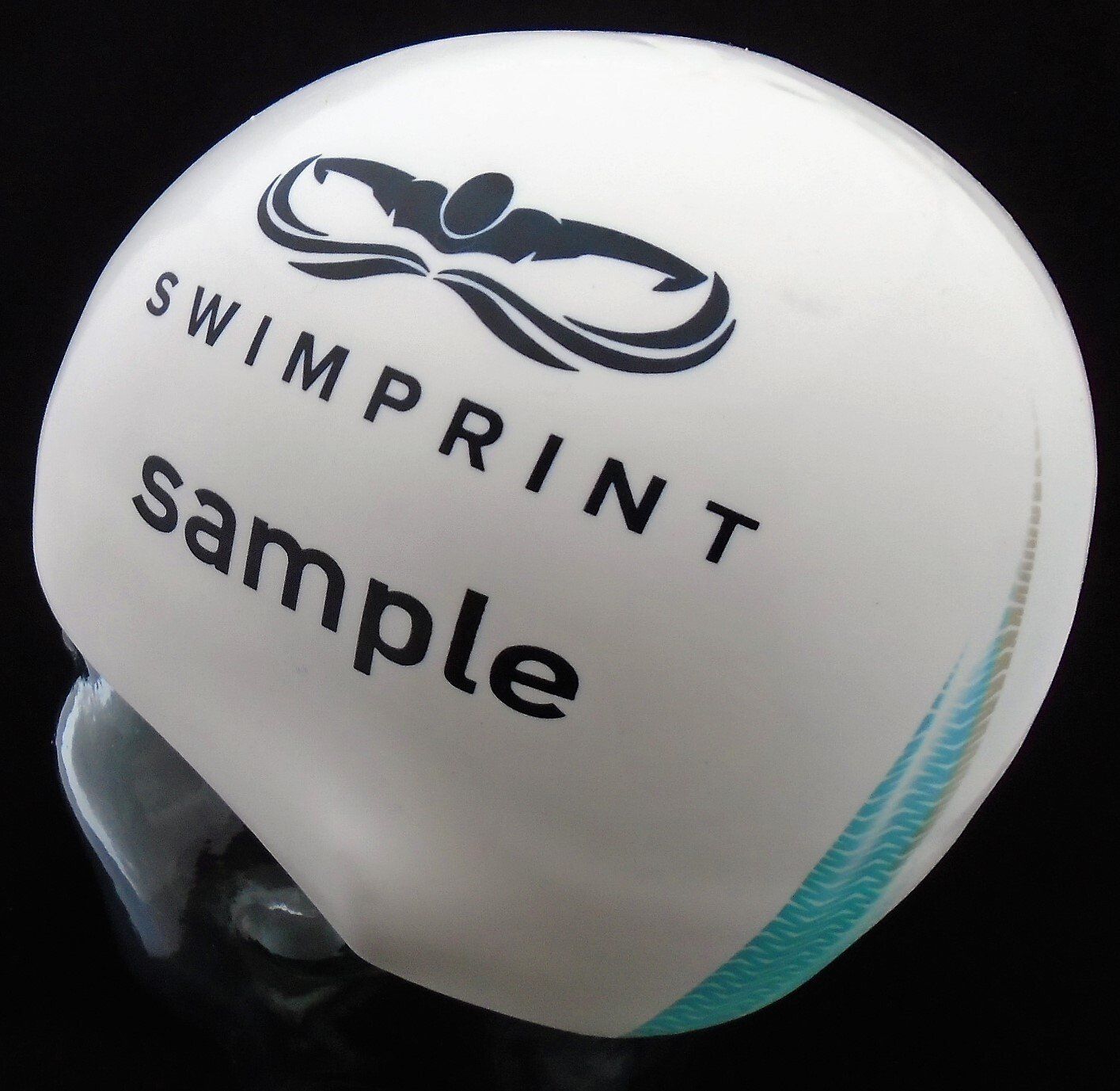 A white helmet that says swimprint sample on it