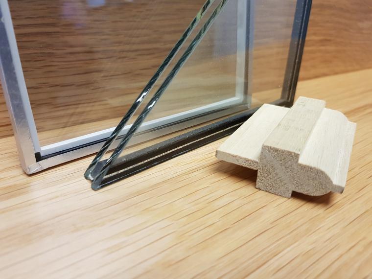 Window profile cut of with metal, glass and insulation