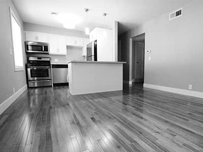 Kitchen with stainless steel appliances and hardwood floors
