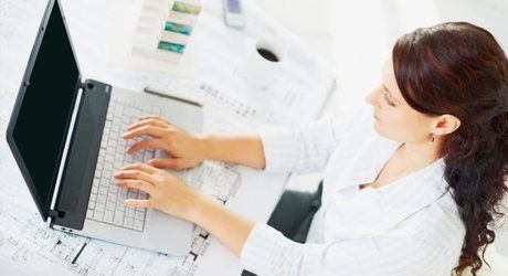 a lady working on laptop