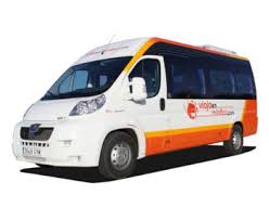 A white and orange van is parked on a white background.