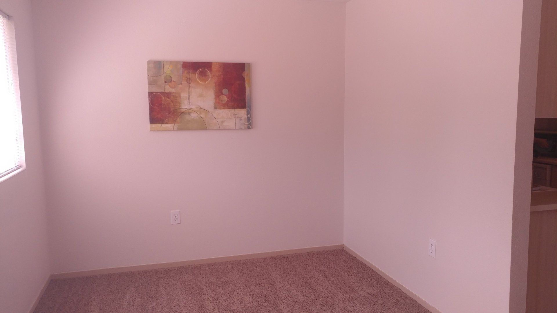 Alternate interior of bedroom with large window