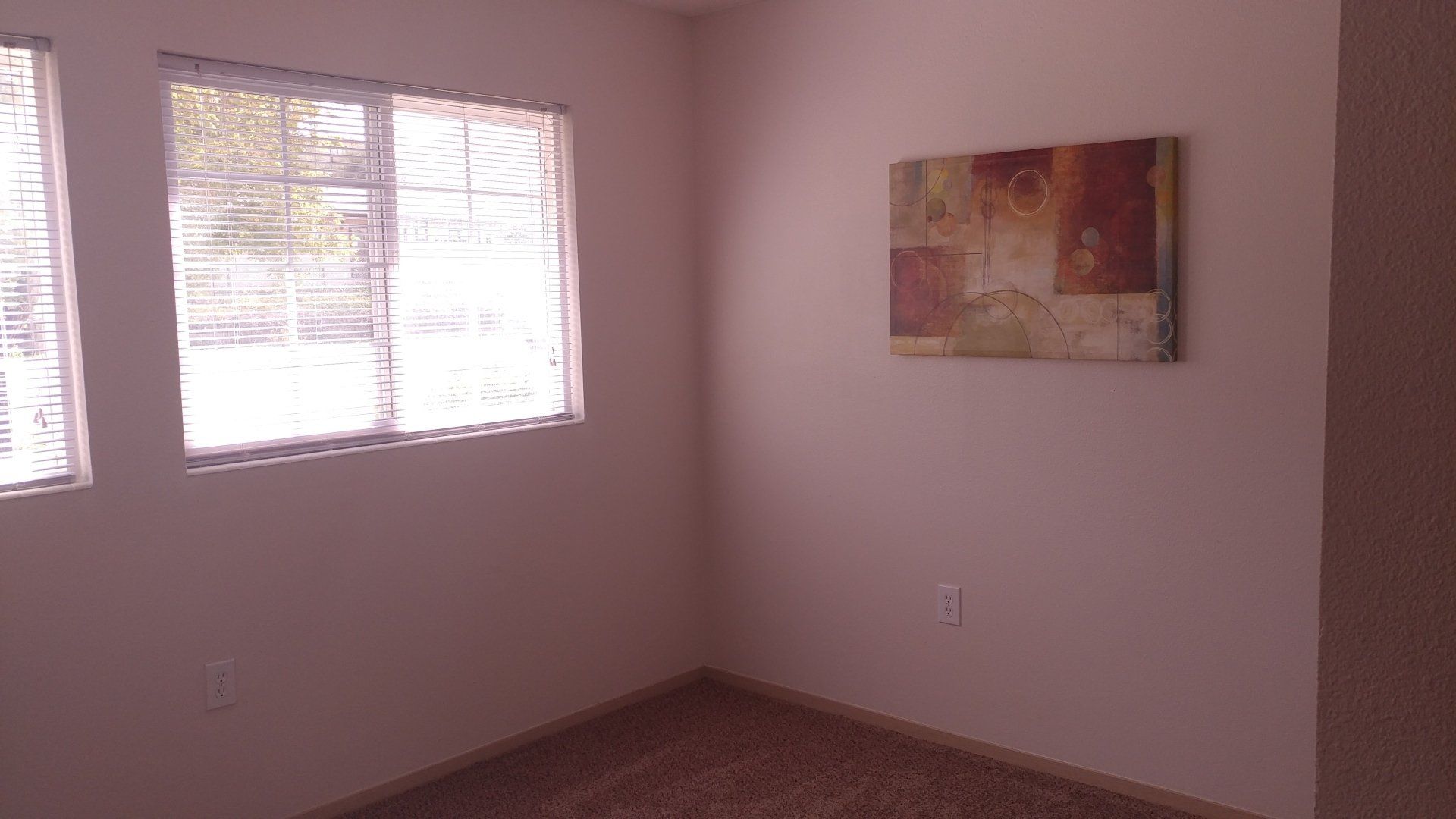 Interior of bedroom with large window