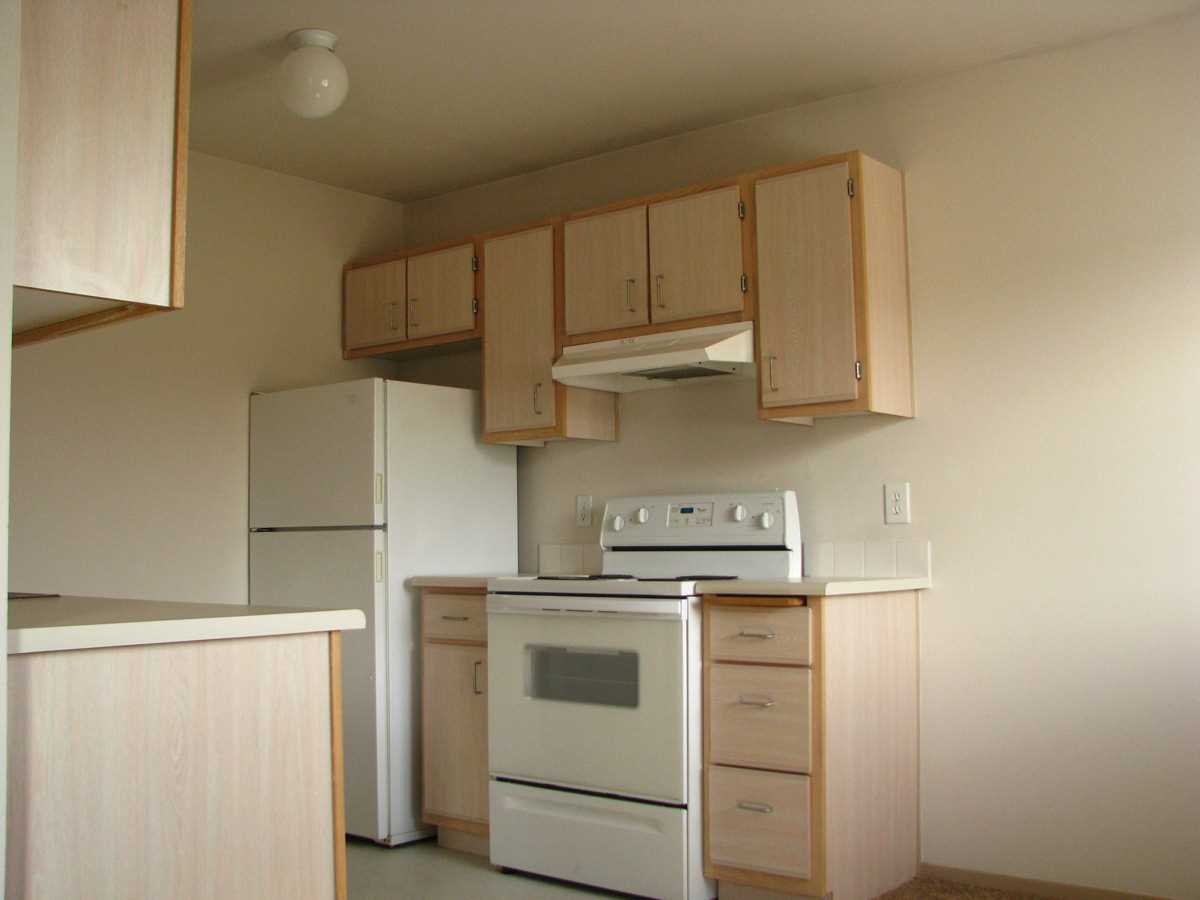 Alternate view of kitchen appliances and countertops
