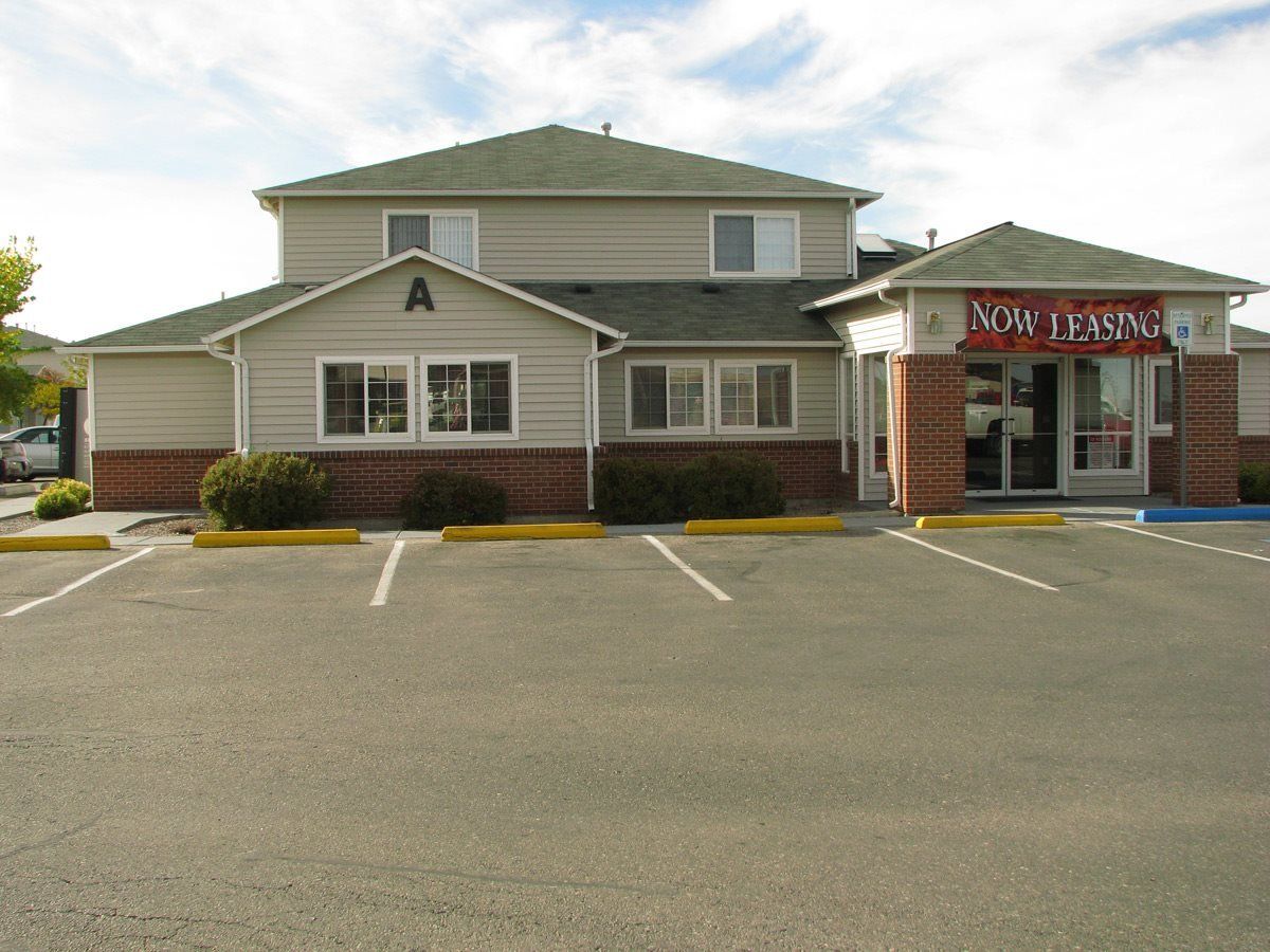 View of Aspen Court Apartments office building