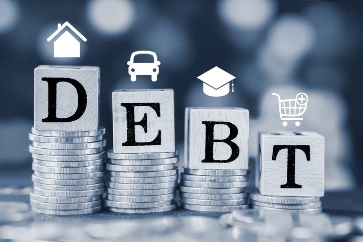 Stack of coins with word debt from home, car, shopping ,education concept background