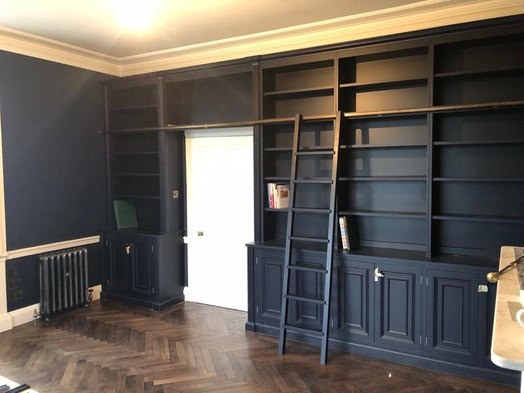 Black accent paint library room