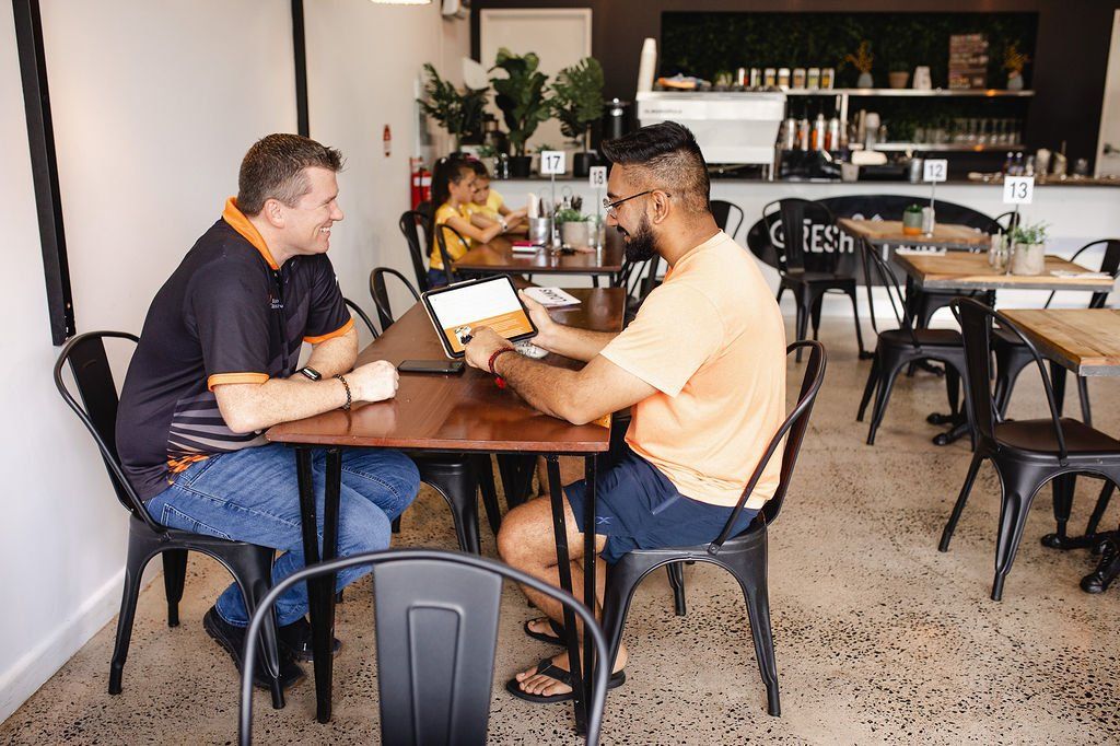 Financial Consultation at Coffee Shop — Finance Broker in Darwin