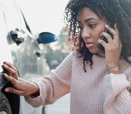 Auto Accident Lawyers — Woman Calling Help in Milwaukee, WI Auto Accident Lawyers — Woman Calling Help in Milwaukee, WI