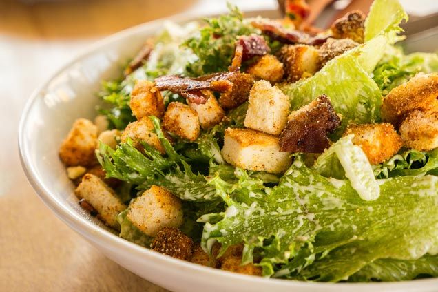Burgers and Sandwiches — Bowl Of Caesar Salad in Sturgen Lake, MN Burgers and Sandwiches — Bowl Of Caesar Salad in Sturgen Lake, MN