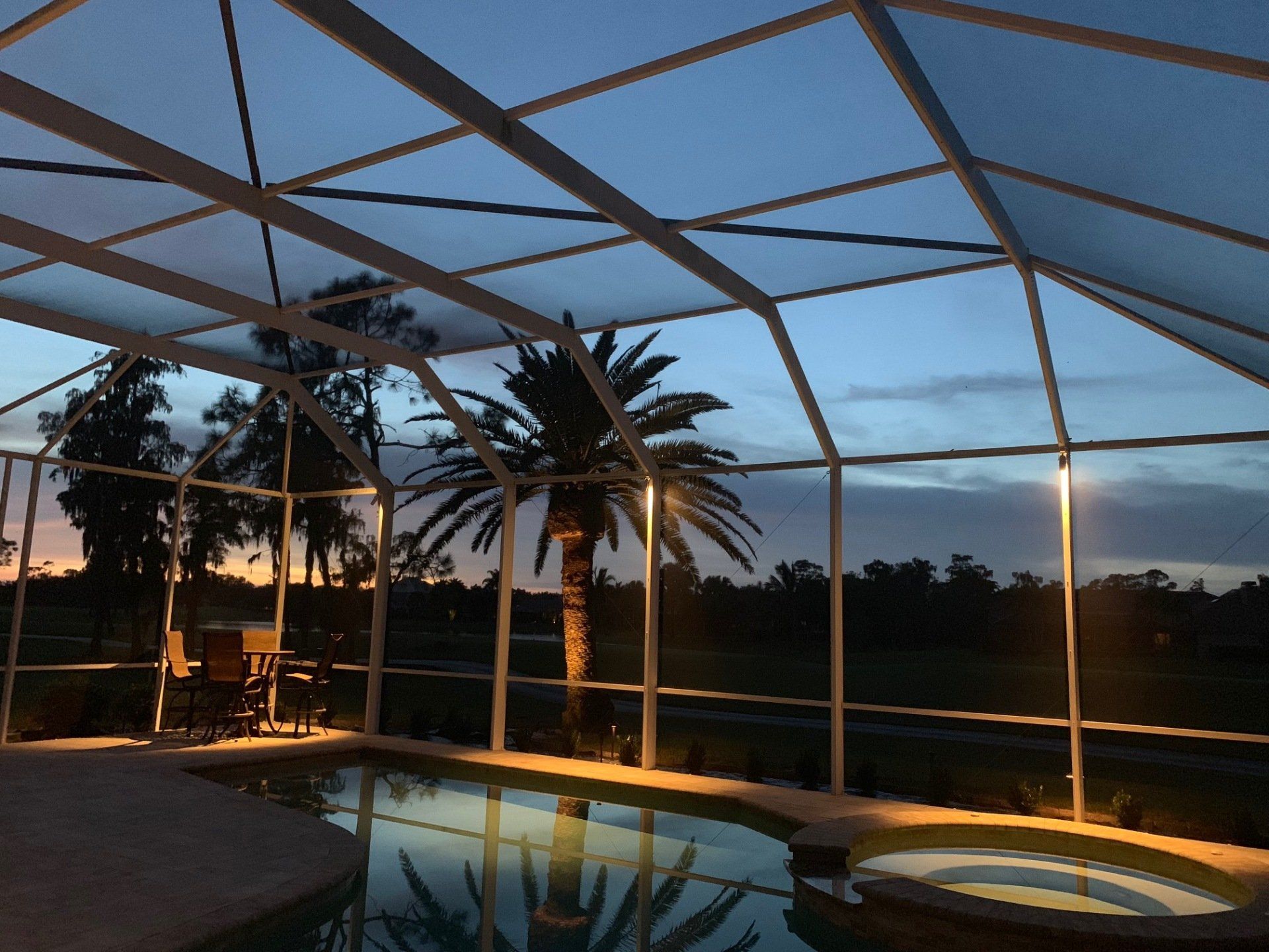 Lighting of Pool Area During Sunrise — Fort Myers, FL — Island Coast Lawn & Landscaping, Inc.