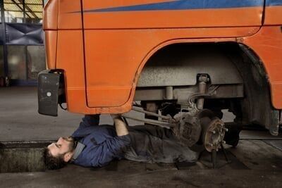 Mechanic under car Mechanic under car