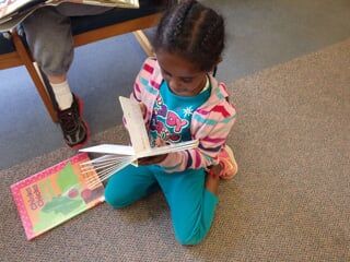 Student in class while teacher reading - Highly Acclaimed Elementary School in North Springfield, VA Student in class while teacher reading - Highly Acclaimed Elementary School in North Springfield, VA