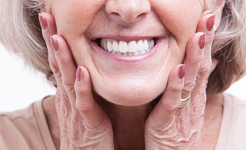 Senior Woman with Dentures—Cosmetic Dentistry in Fillmore, CA Senior Woman with Dentures—Cosmetic Dentistry in Fillmore, CA