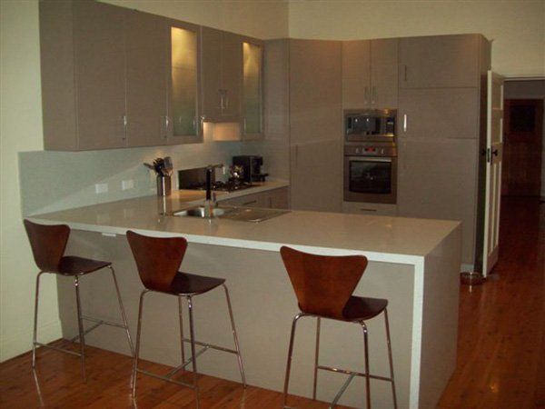 kitchen after renovation with red accents